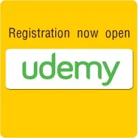 Yellow banner with "Registration now open," the Udemy logo in green text, and an introduction to Microcontrollers and the C Programming Language.