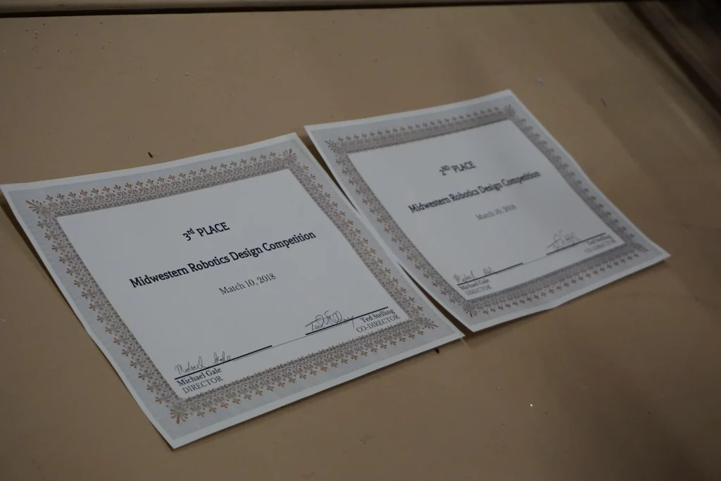 Two certificates for 3rd place in the Midwest Robotics Design Competition, dated March 10, 2018.