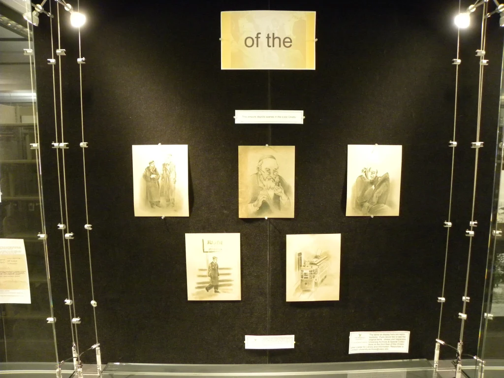 Art display case at the Christopher Center with six black-and-white sketches, part of Holocaust Displays, and a sign above reading "of the".
