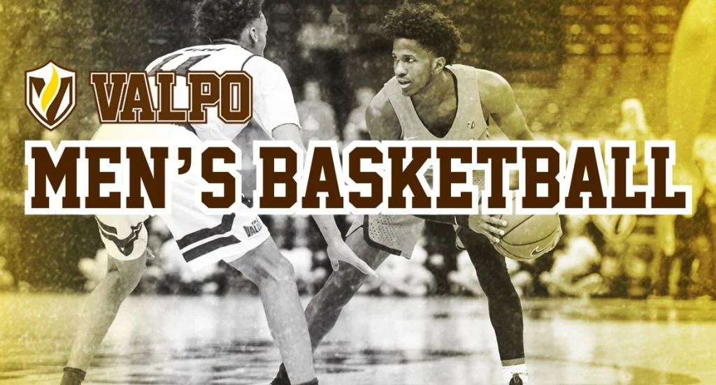 Two college basketball players in action; text reads "Valpo Men's Basketball" with a gold and white shield logo, highlighting the intensity of basketball and excitement for the Valpo Men’s Basketball nonconference schedule.