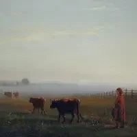A person in red clothing stands near cows in a misty, open pasture with a fence in the distance, capturing a tranquil moment often featured in rural exhibitions & series.