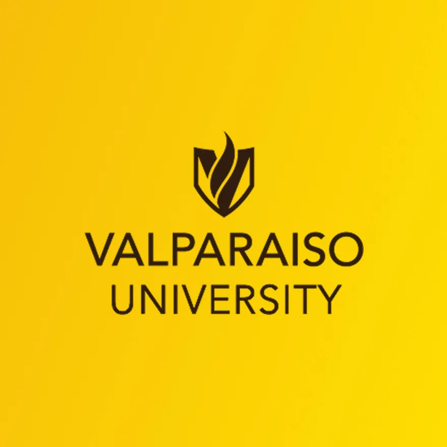 Valparaiso University logo with a flame symbol on a bright yellow background, representing excellence in fields like Business Analytics.