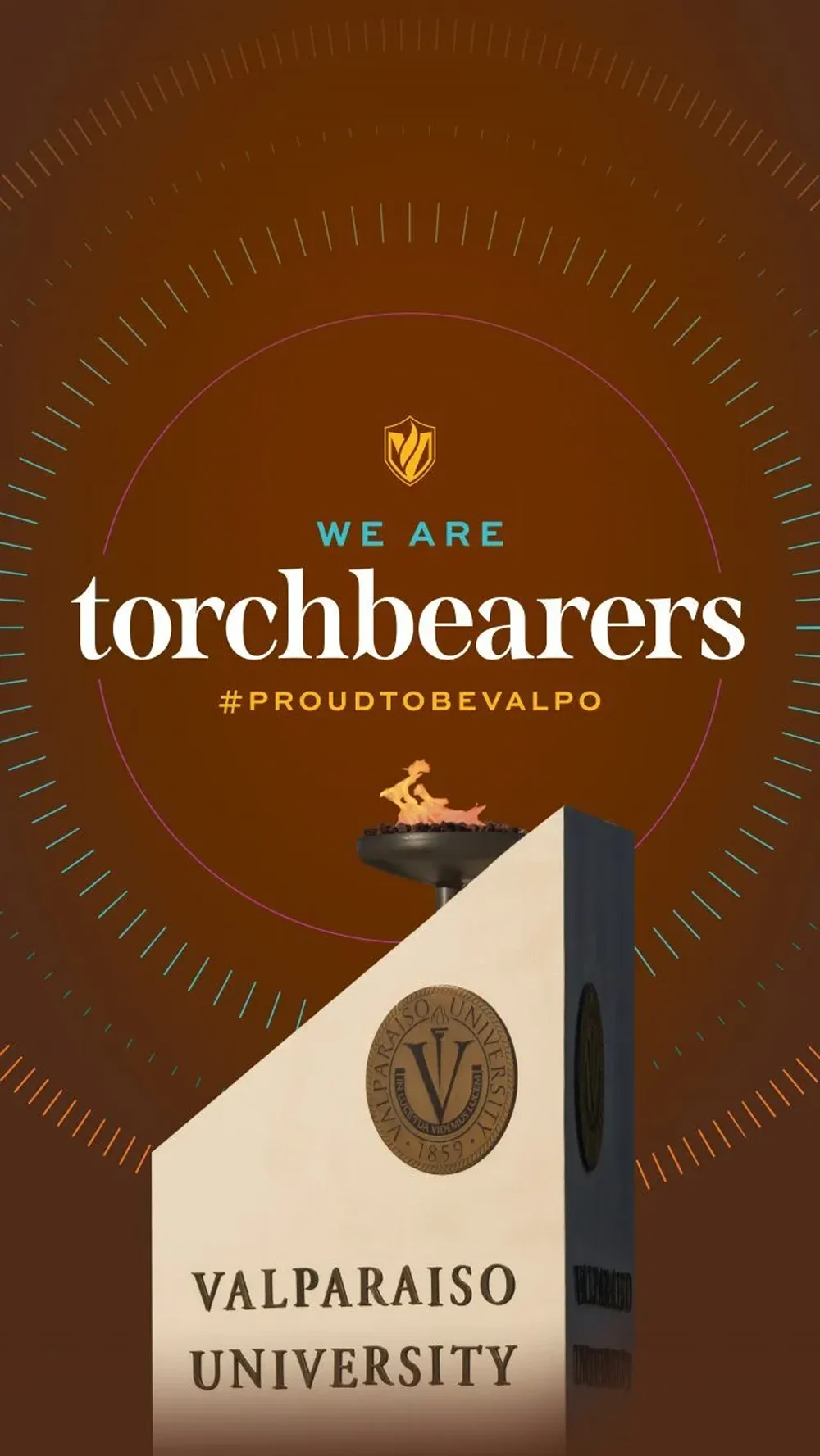 Valparaiso University torch monument with “We are torchbearers #ProudToBeValpo” text above it.